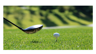 golf club and ball on tee