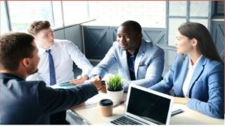 Picture of people conducting a interview.