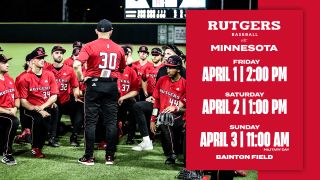 baseball players kneeling before coach